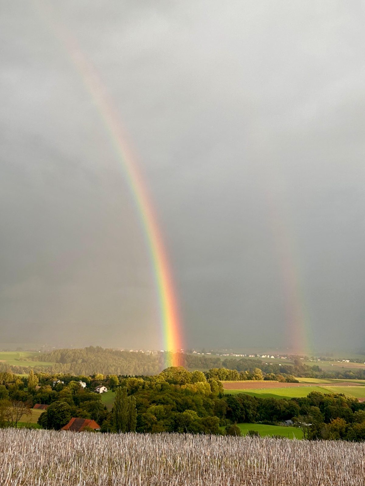 Un double arc-en-ciel photographié par Nadiejda — le pont d'amour vers ceux qui ont rejoint l'autre rive